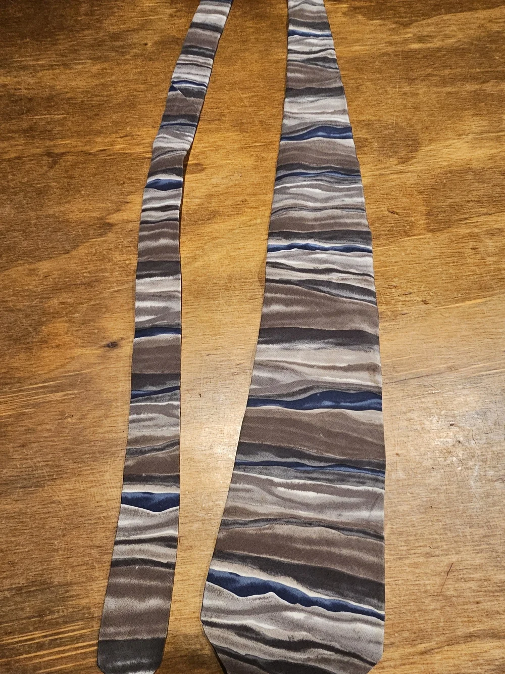 C3, The Pierre Cardin Men's Tie is a high-quality accessory made from 100% silk.